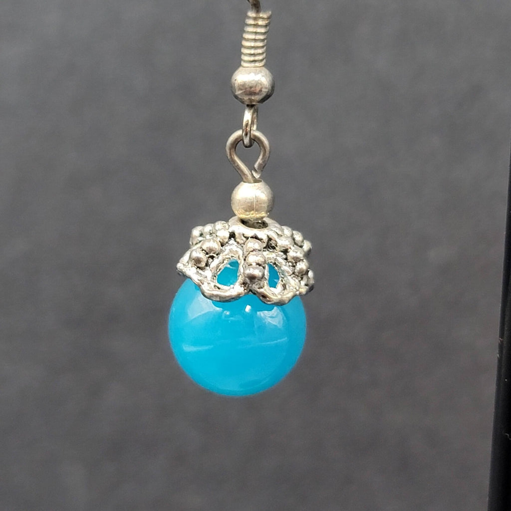 Pierced Earrings Silver tone Filigree Capped Blue Glass Bead Dangle 3/4"