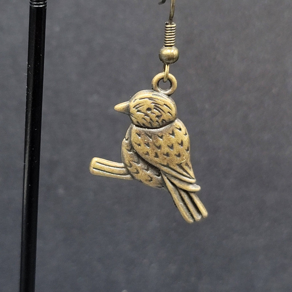 Bird on Perch Pierced Earrings Bronze tone Embossed Dangle 1"