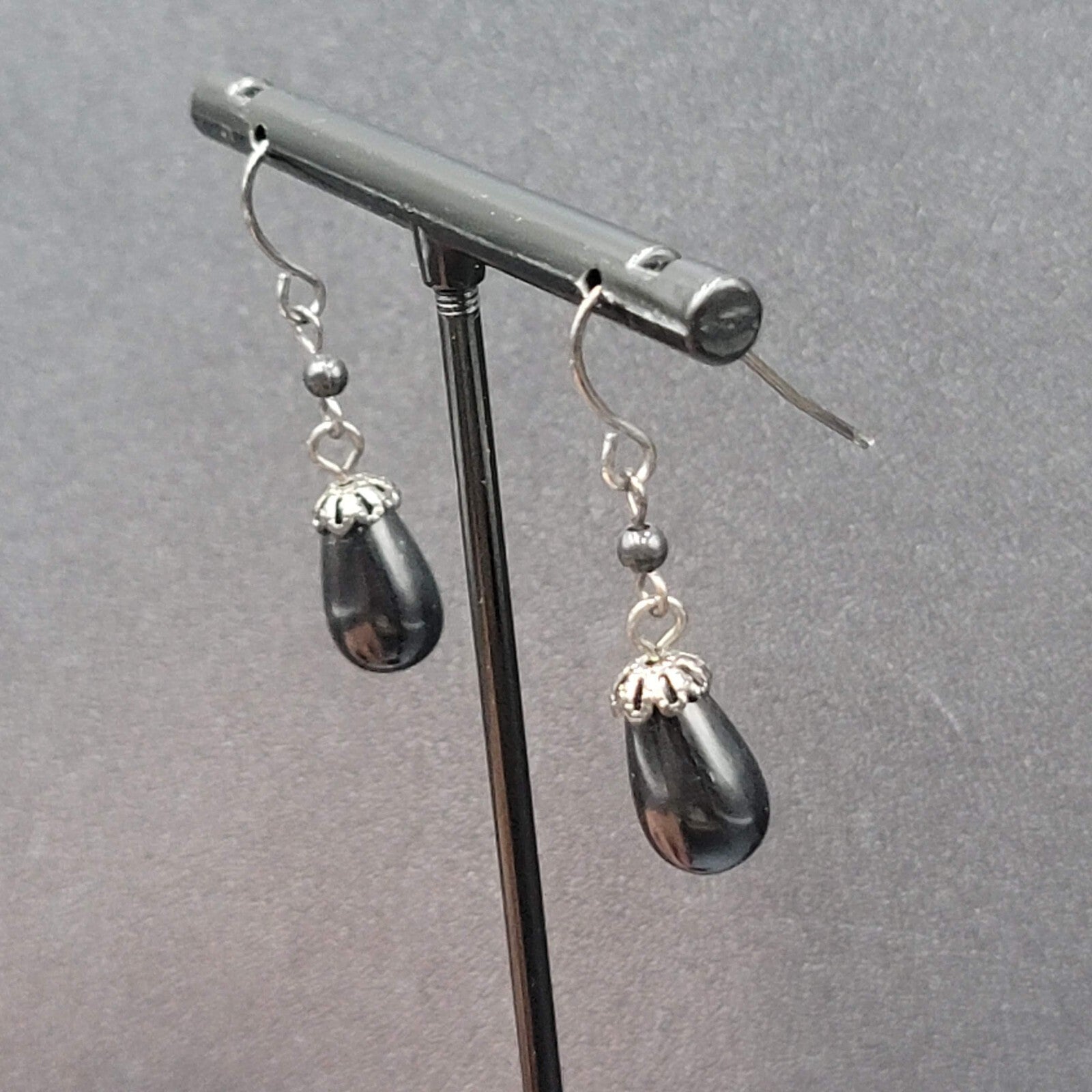 Pierced Earrings Black Metal Capped Teardrop Bead 3/4"