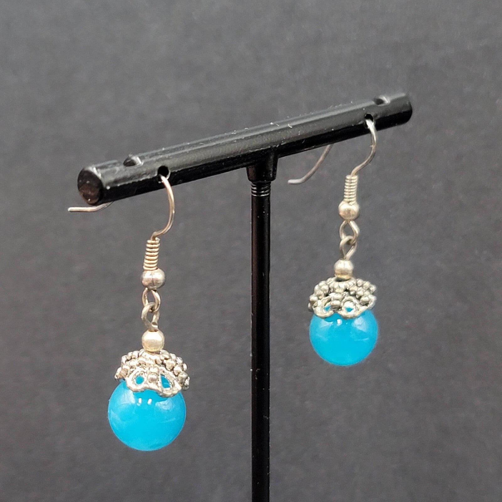 Pierced Earrings Silver tone Filigree Capped Blue Glass Bead Dangle 3/4"