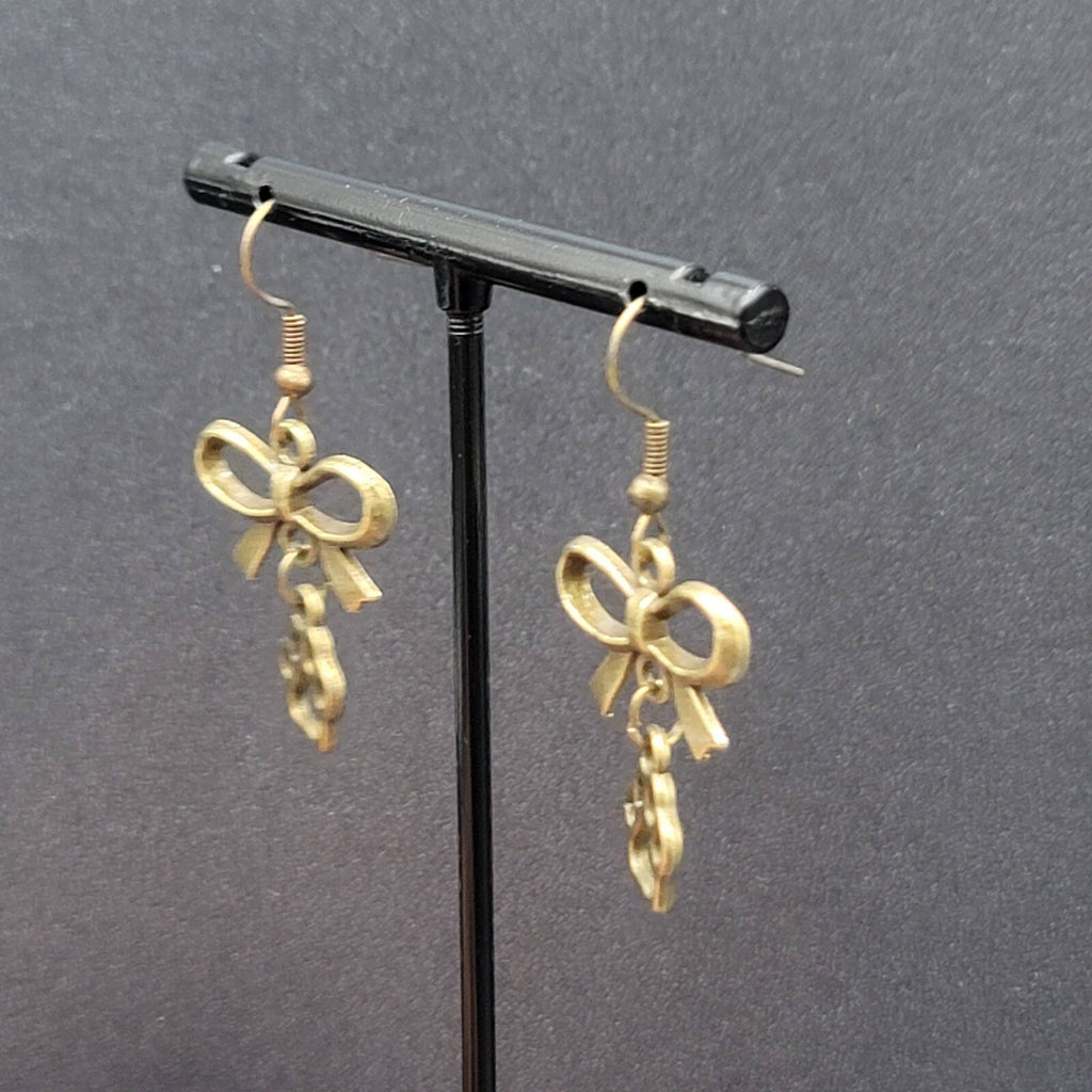 Pierced Bow Dog Paws Earrings Bronze tone Dangle 7/8"