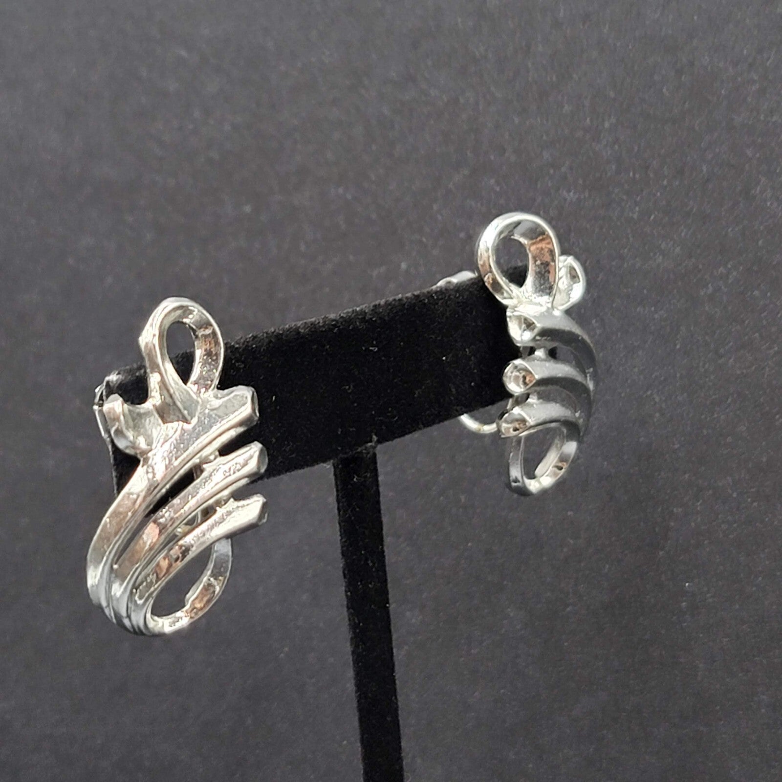 Vintage Clip on Earrings Pat Pend Silver tone Swirl Climber 1.25"