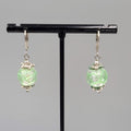 Green Swirl Glass Bead Pierced Earrings Silver tone Dangle 3/4"