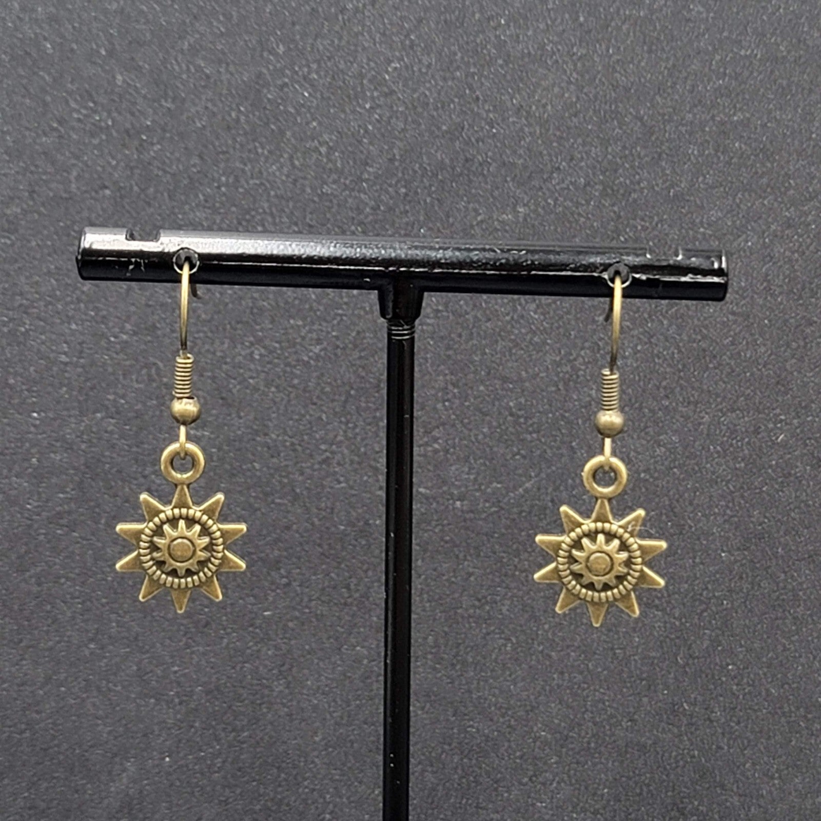 Sun Pierced Earrings Bronze tone Embossed Dangle New 5/8"