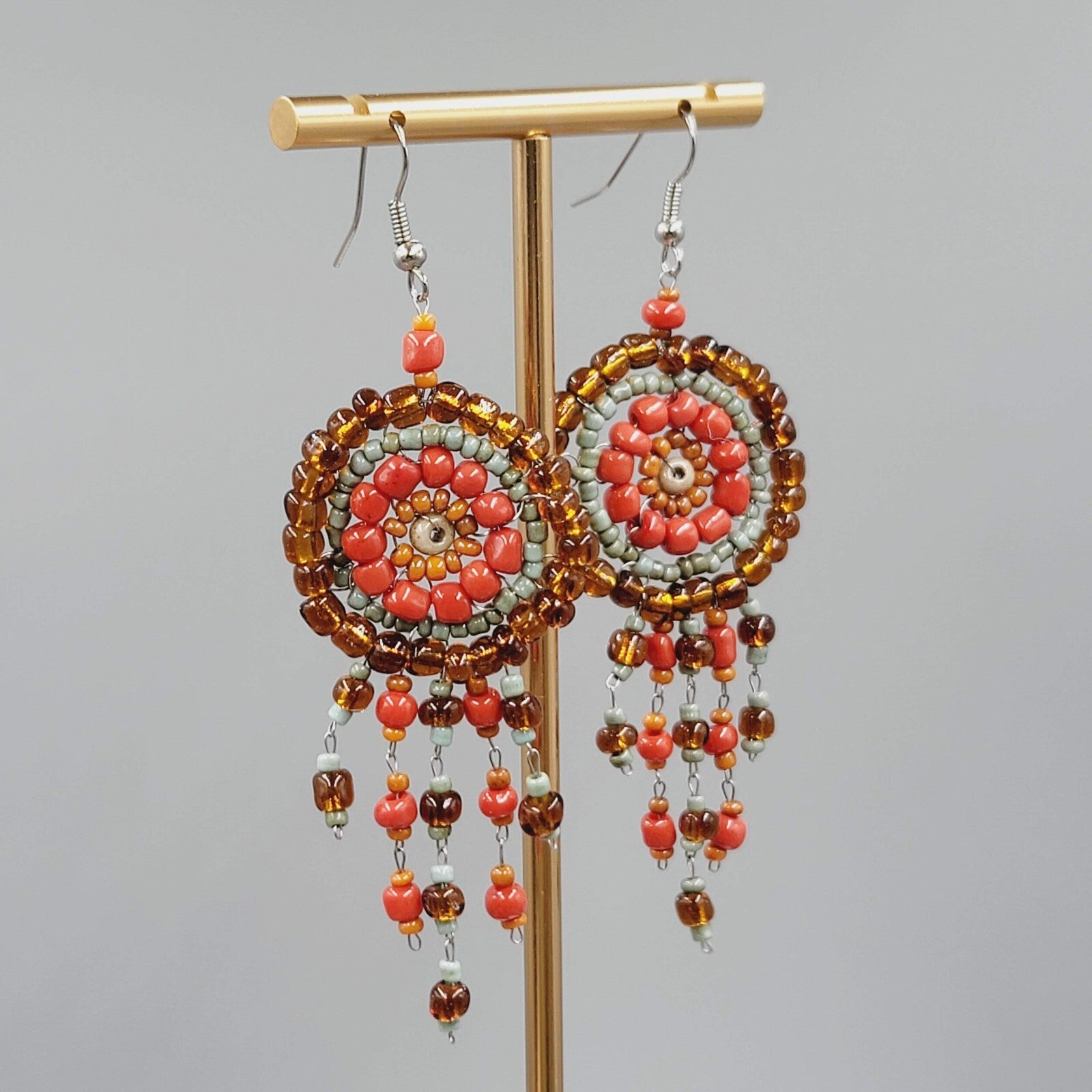 Medallion Bead Pierced Earrings Silver tone Dangle Orange Brown Blue 2.25"