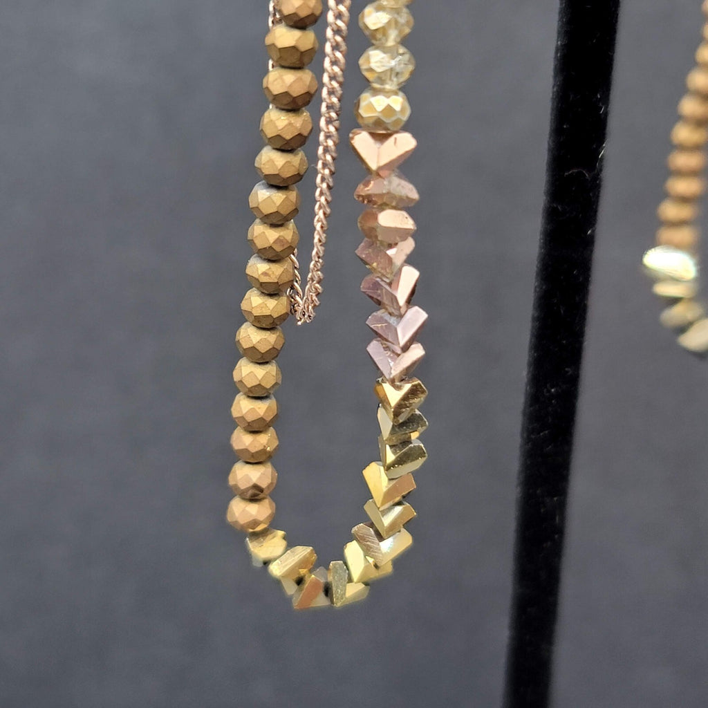 Pierced Earrings Gold tone Small Faceted Beads Dangle Loop To Back 3.25"