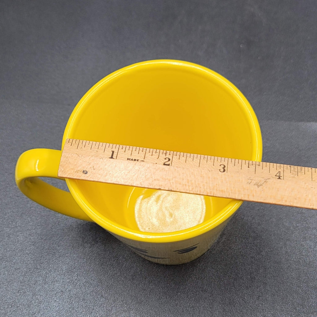 Torpedo Coffee Mug Cup Yellow Winky Face iti