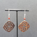 Pierced Earrings Silver tone Cut Coconut Bead Dangle 1.5"