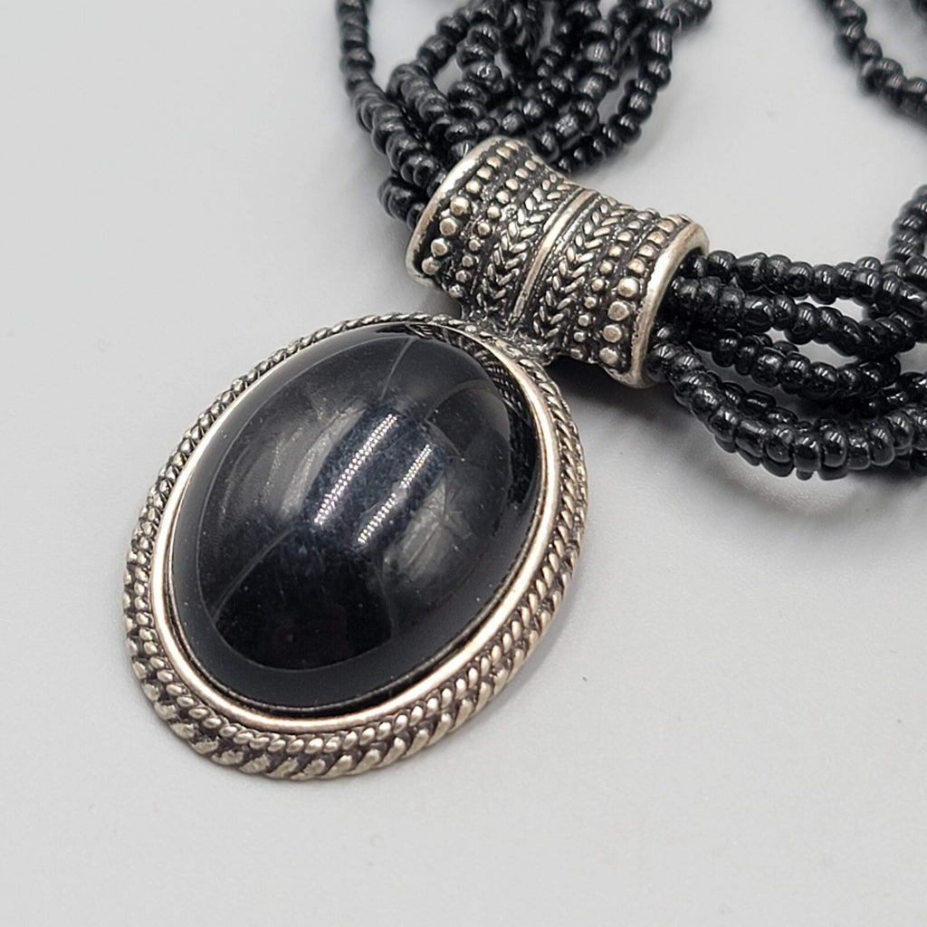 Multi Strand Black Seed Bead Necklace Oval Pendant Silver tone 18"