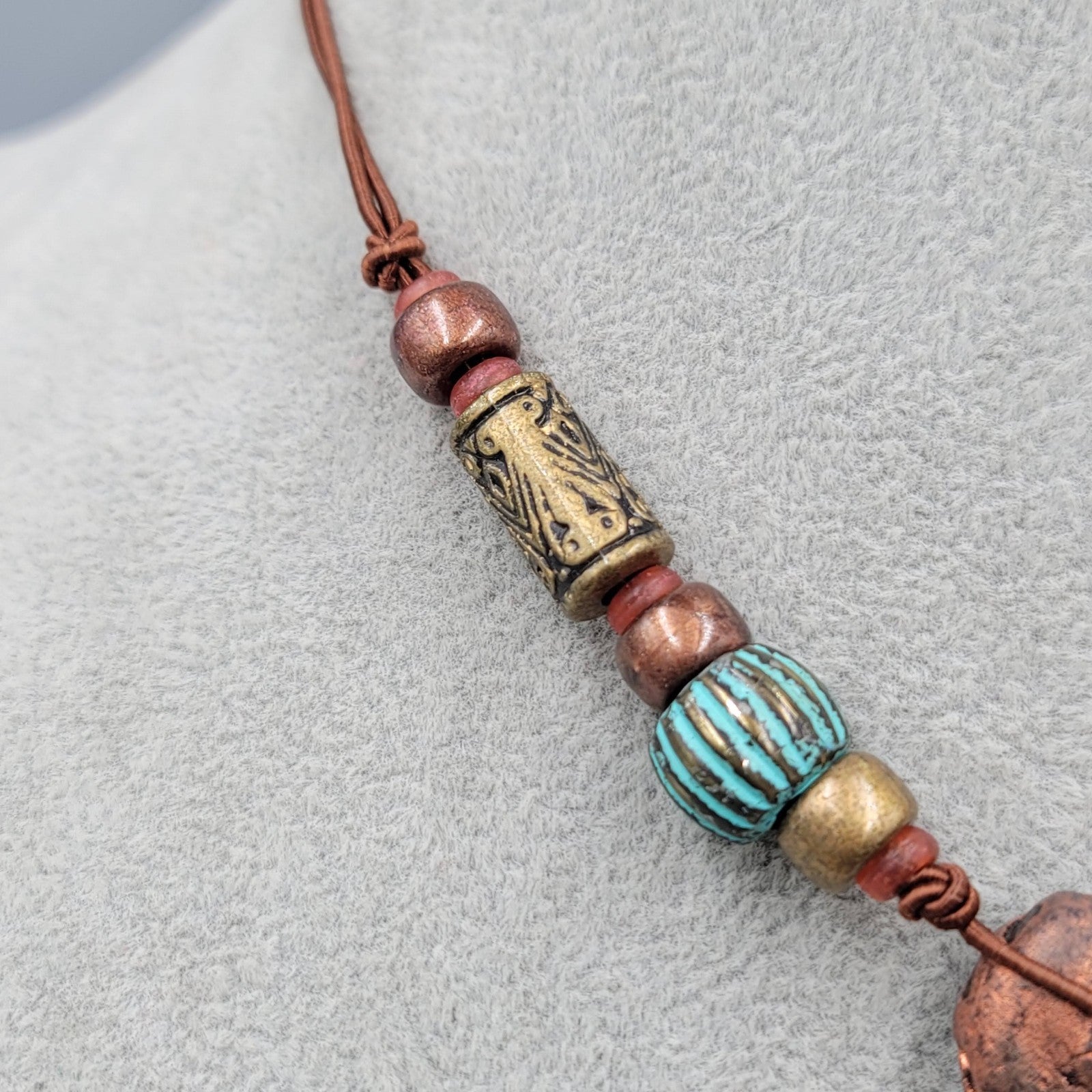 Artisan Tribal Bead Necklace Blue Bronze Colors Brown Cord 16 in