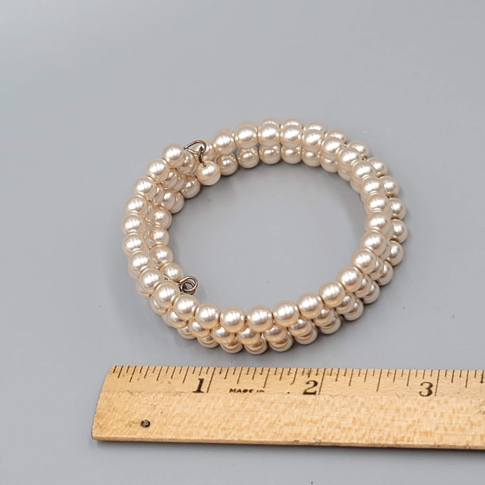 Vintage Monet Faux Pearl Beaded Coil Bracelet Womens Cream Three Row Memory Wire