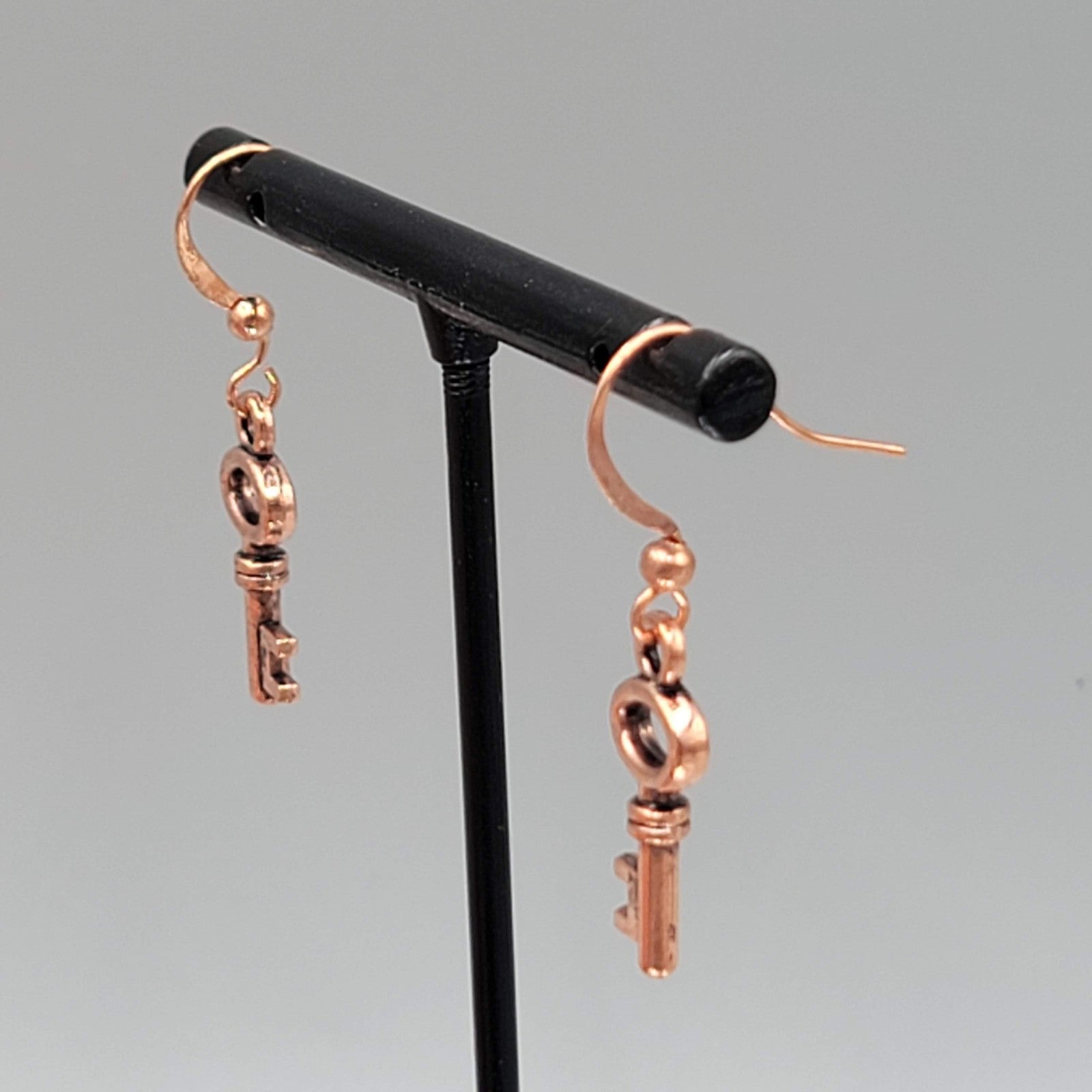 Copper tone Skeleton Key Pierced Earrings Dangle Small 3/4"