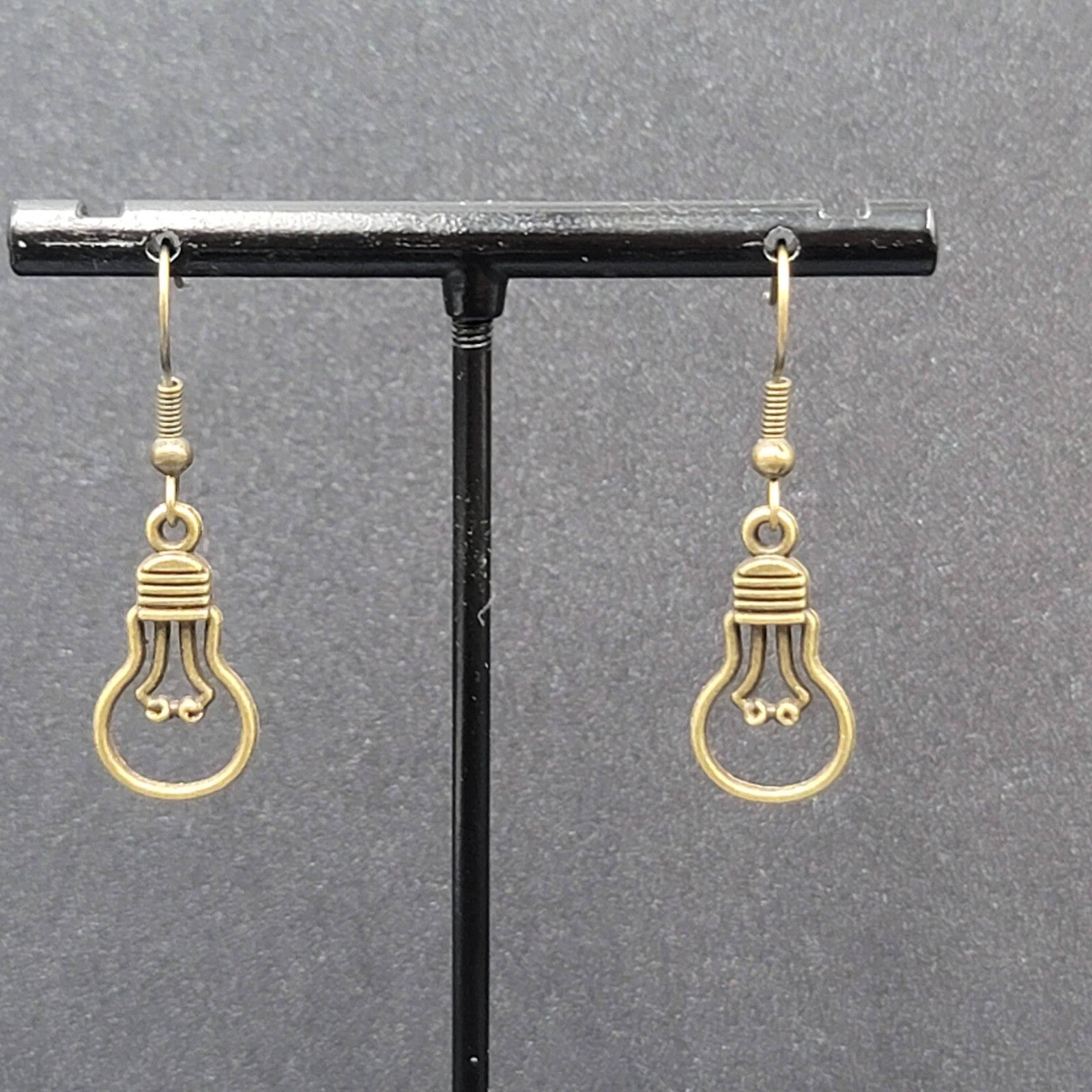 NEW Light Bulb Idea Pierced Earrings Bronze tone Dangle 7/8"
