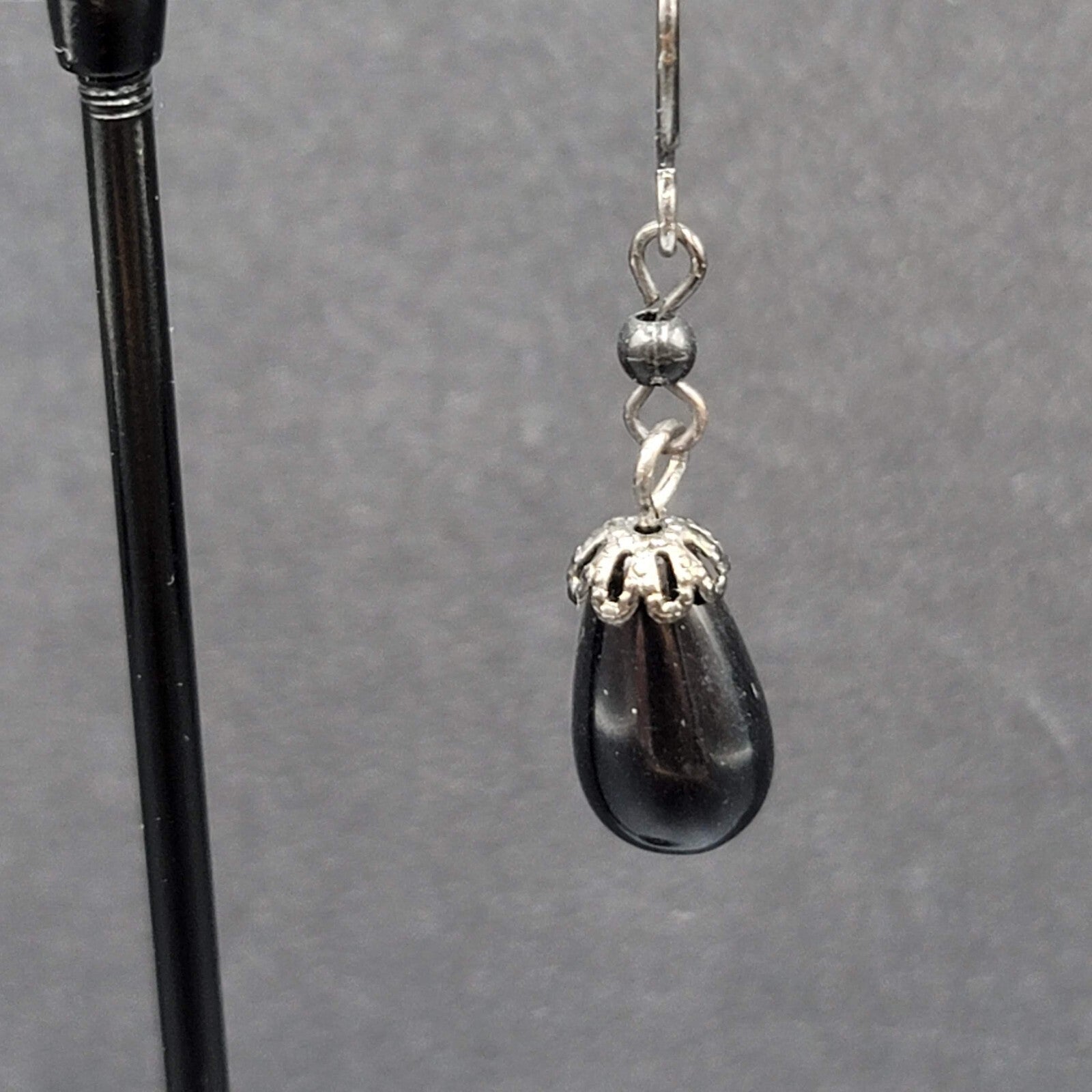 Pierced Earrings Black Metal Capped Teardrop Bead 3/4"
