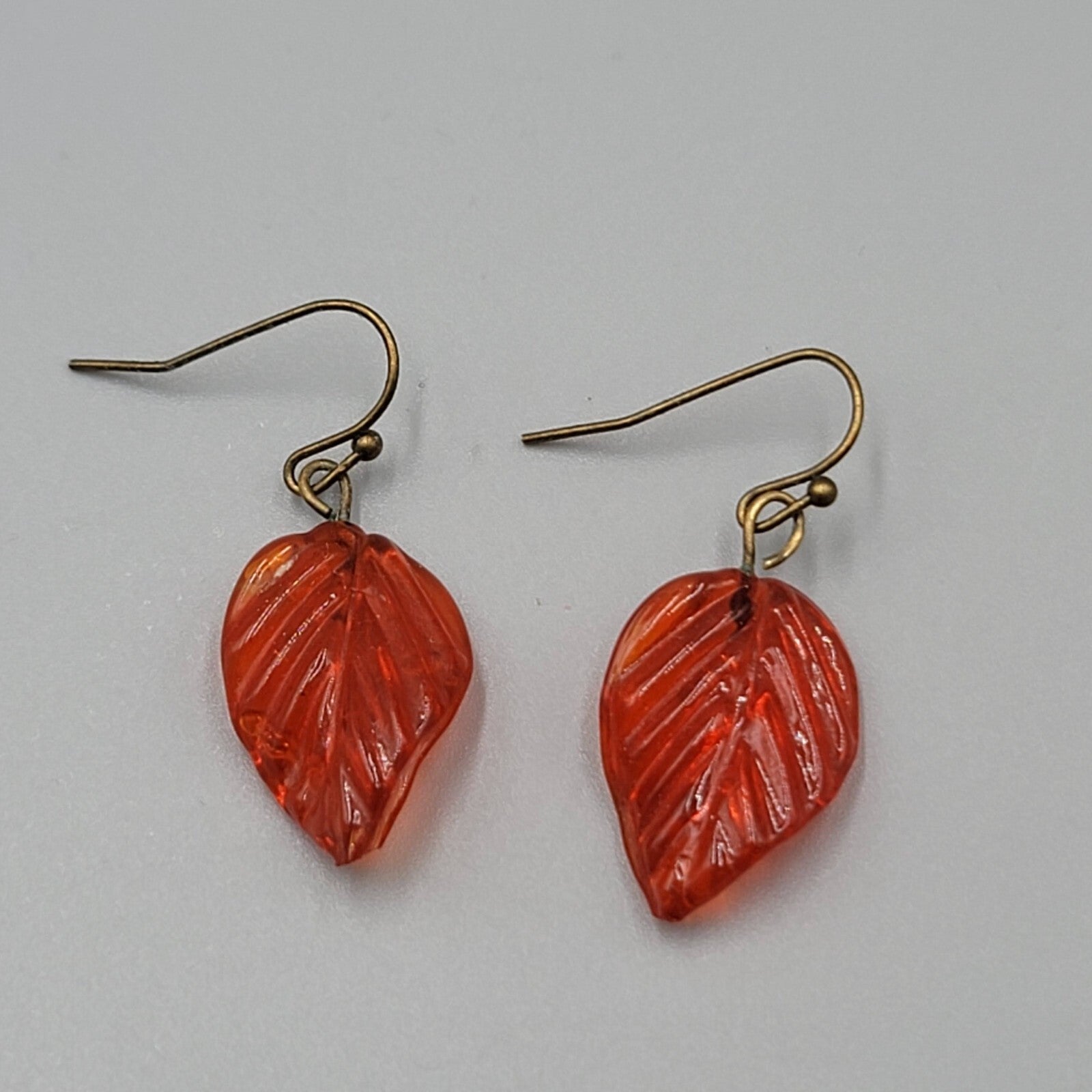 Orange Glass Leaf Pierced Earrings Bronze tone Dangle 1"