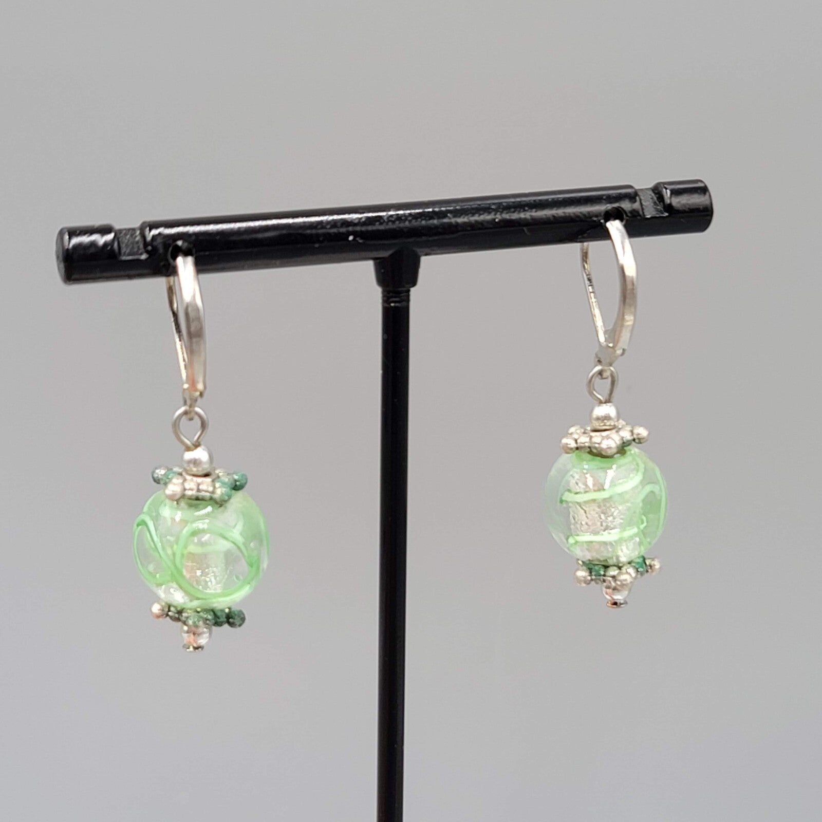 Green Swirl Glass Bead Pierced Earrings Silver tone Dangle 3/4"