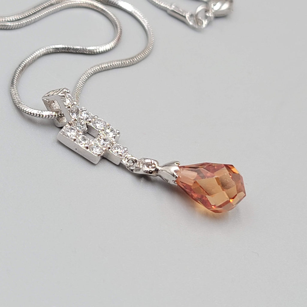 Orange Crystal Teardrop Pendant Necklace Silver tone Snake Chain 15"