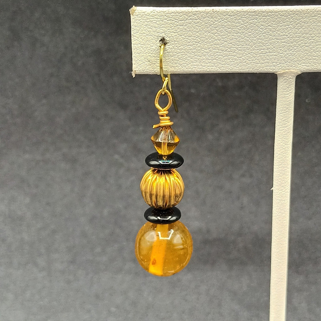 Pierced Earrings Gold tone Orange Black Beaded Statement Dangle 1.5"