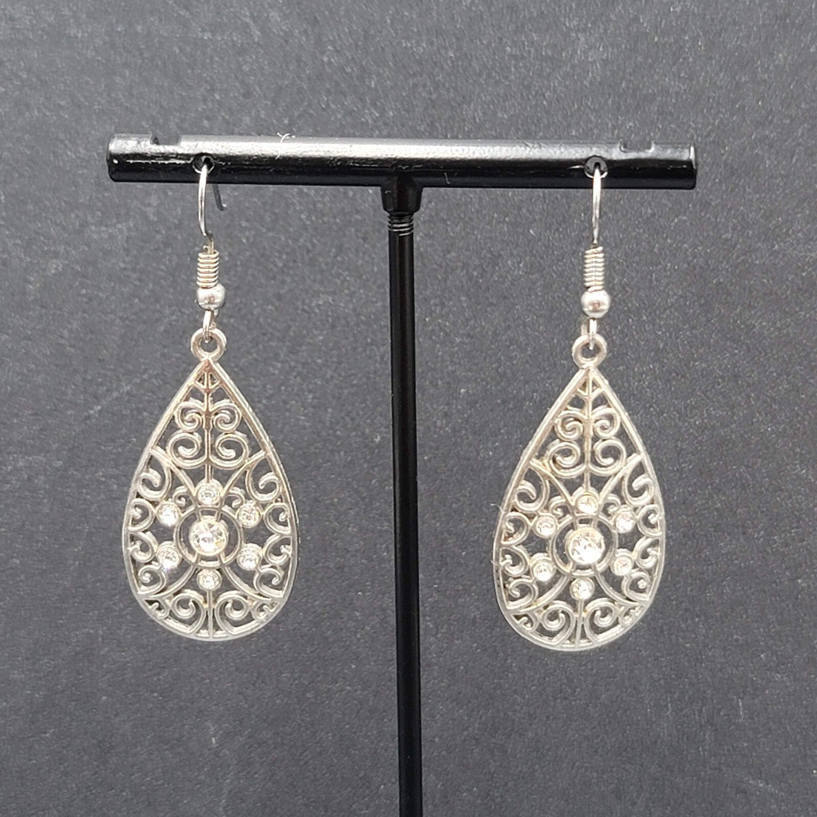 Pierced Earrings Silver tone Rhinestone Open Work Teardrop Dangle 1.25"