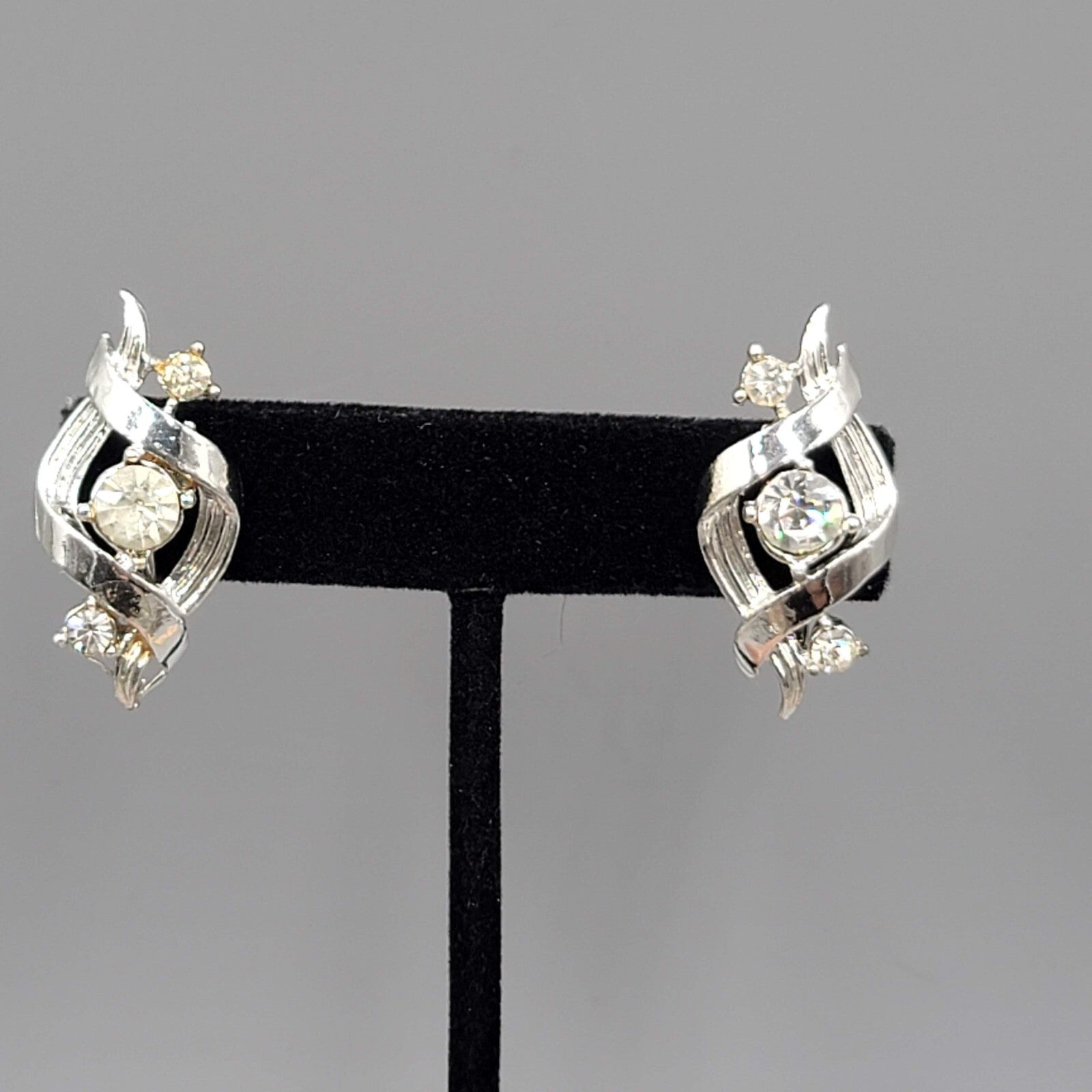 Vintage Clip on Earrings Silver tone Climber Rhinestone Twirl 1 1/8"