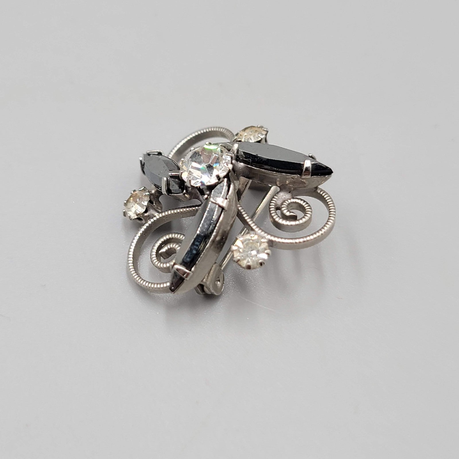 Vintage Black Hematite Rhinestone Brooch Silver tone Swirl 1 in