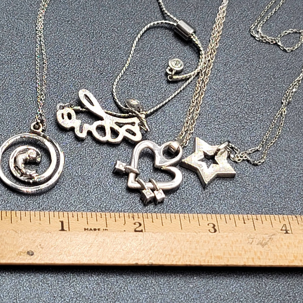 Lot of 4 Costume Crystal Silver tone Jewlery 3 Pendant Necklaces 1 Love Bracelet