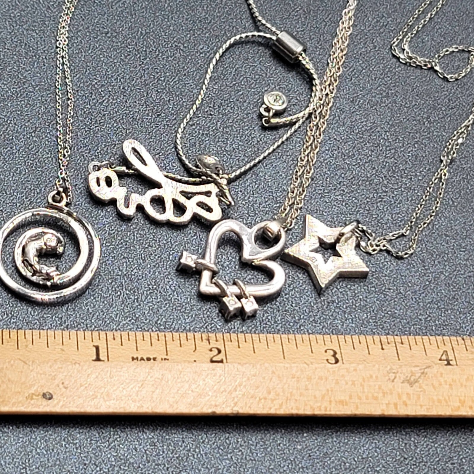 Lot of 4 Costume Crystal Silver tone Jewlery 3 Pendant Necklaces 1 Love Bracelet