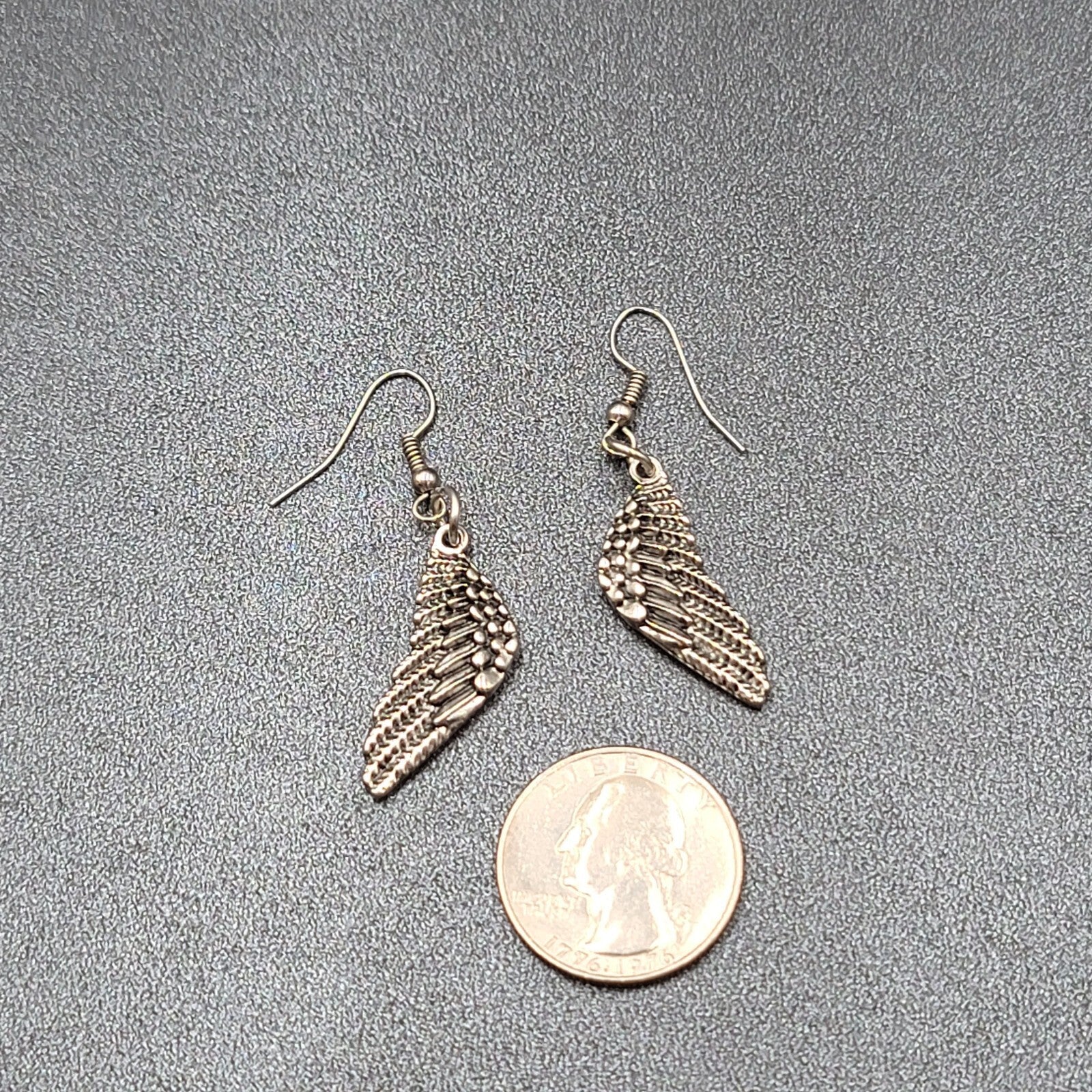 Pierced Earrings Silver tone Detailed Wings Dangle 1 1/8"