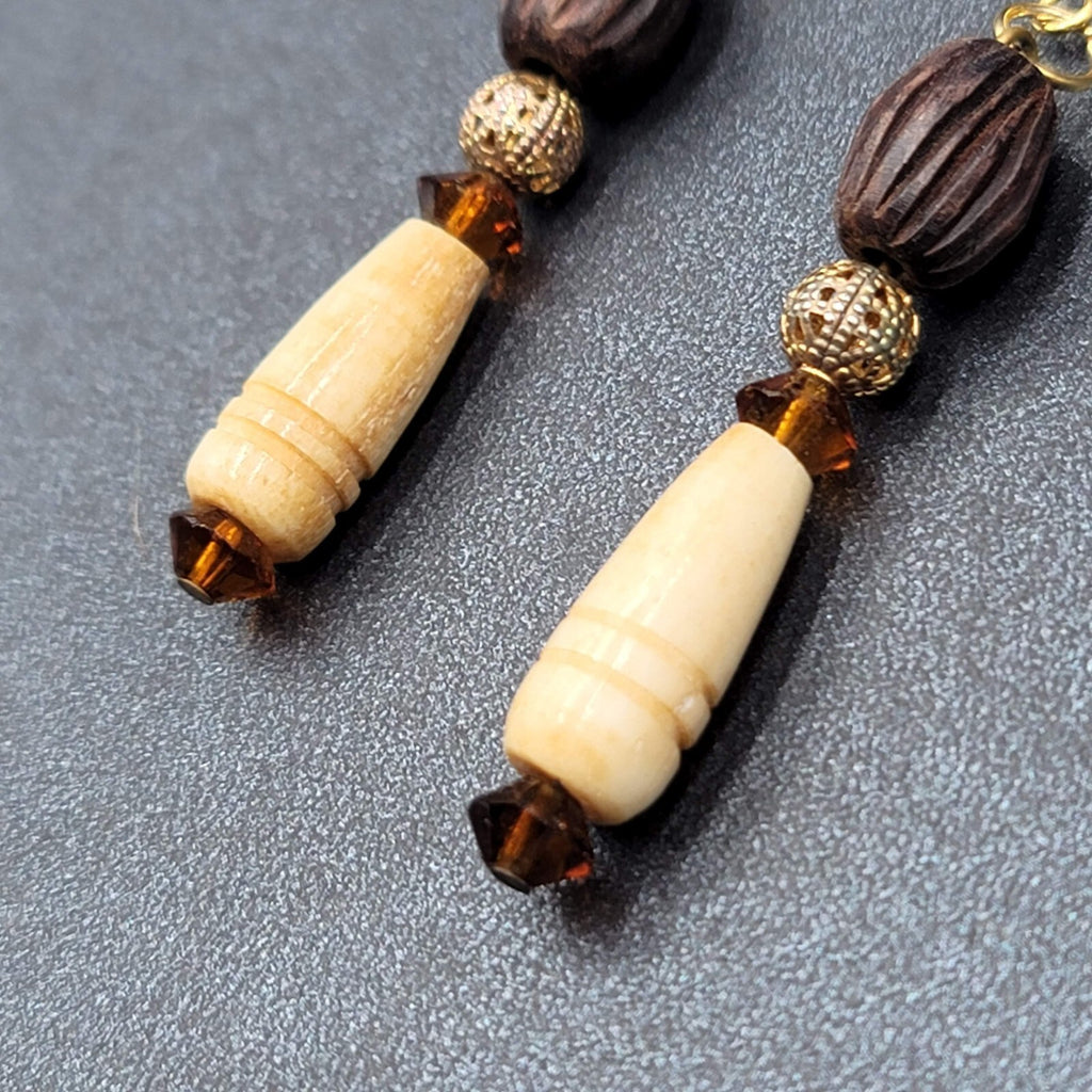 Pierced Earrings Gold tone Wood Hand Carved Beads Dangle 2"