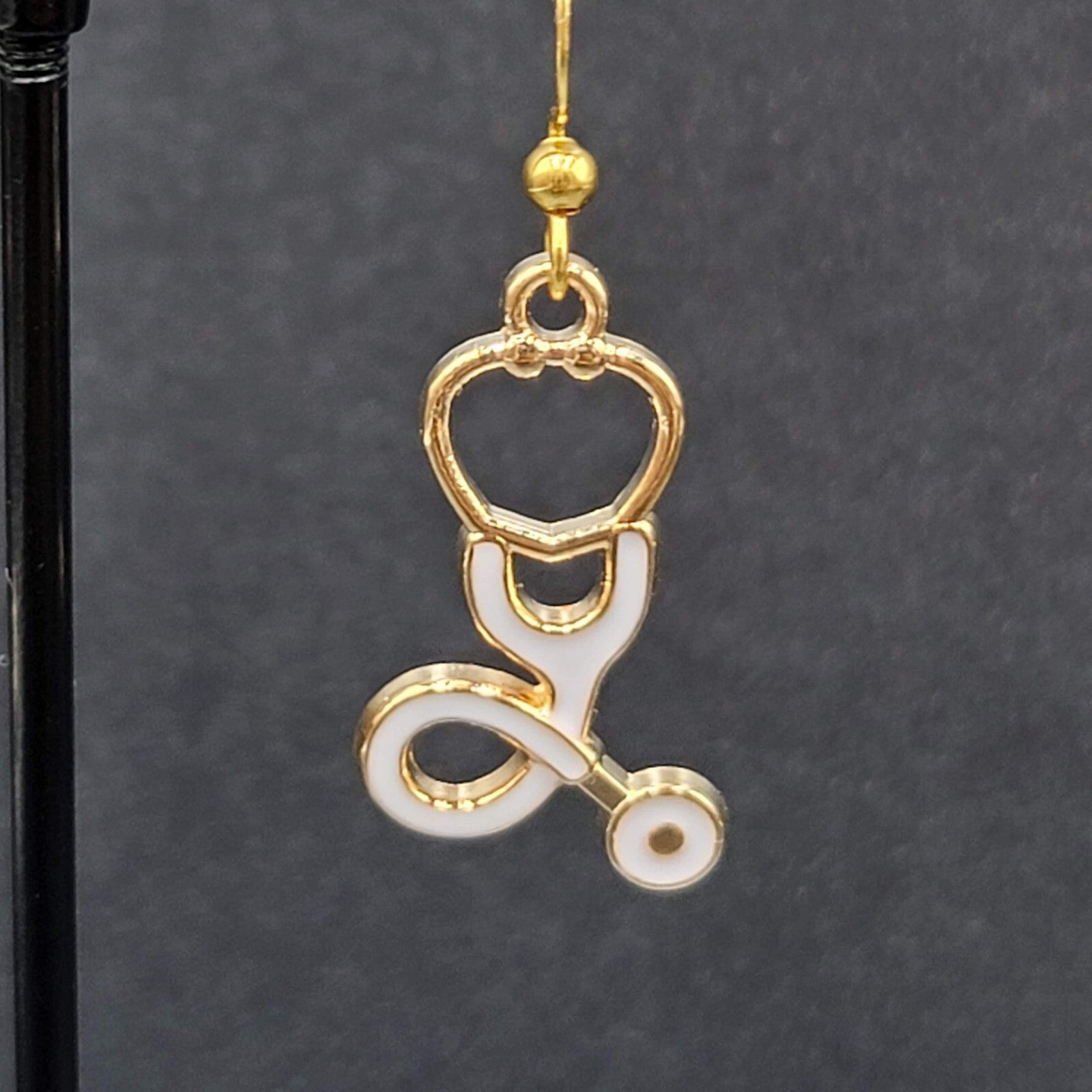 Nurse Pierced Earrings White Enamel Stethoscope Gold tone Dangle 1 1/8"