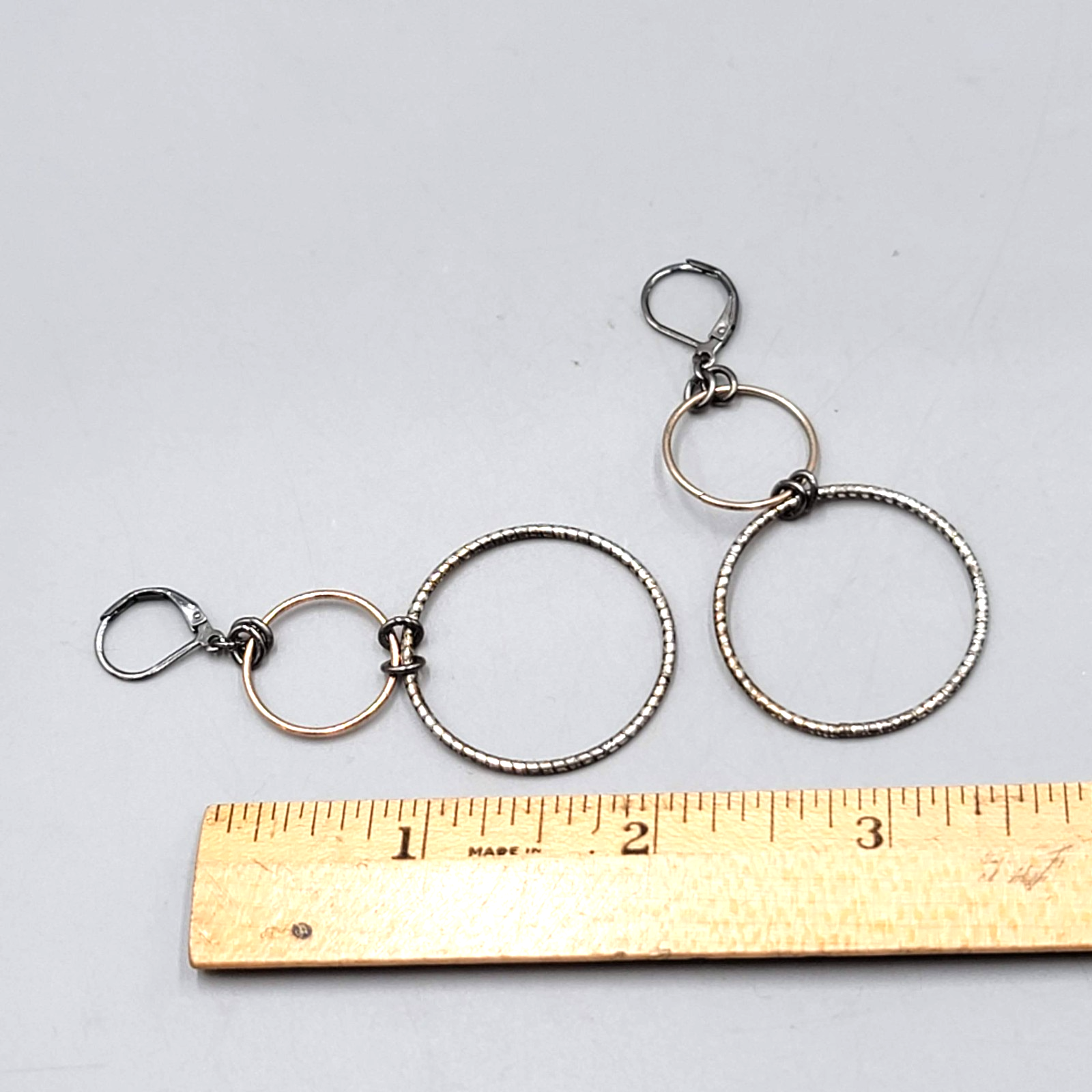Pierced Earrings Black Gold tone Double Ring Dangle 2 in