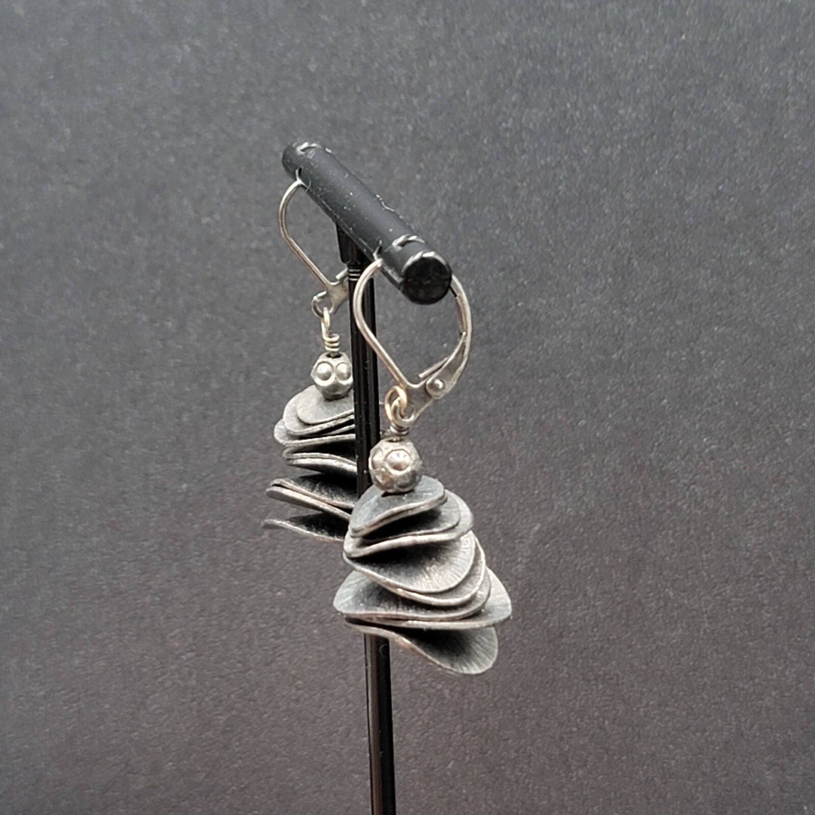 Pierced Earrings Black Metal Layered Wavy Discs Dangle 1 1/8"
