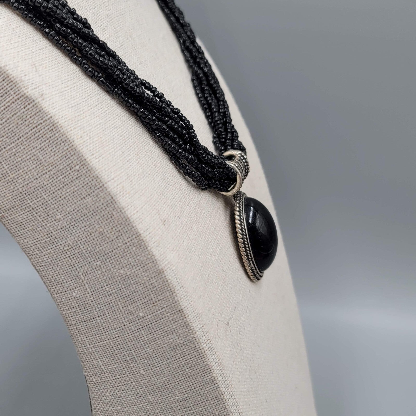Multi Strand Black Seed Bead Necklace Oval Pendant Silver tone 18"