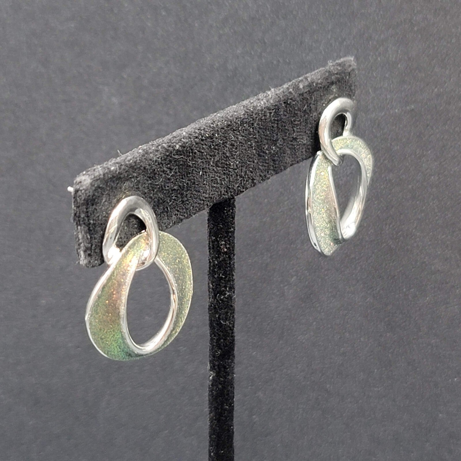 Pierced Earrings Silver tone Iridescent Glitter Interlocking Rings Drop 1 1/8"