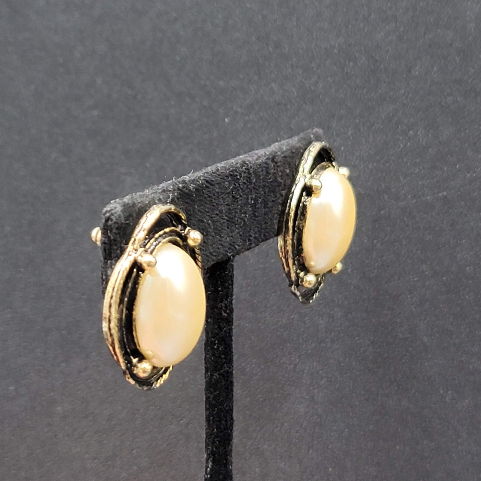 Vintage Pierced Earrings Gold tone White Cabochon Oval Drop 1"