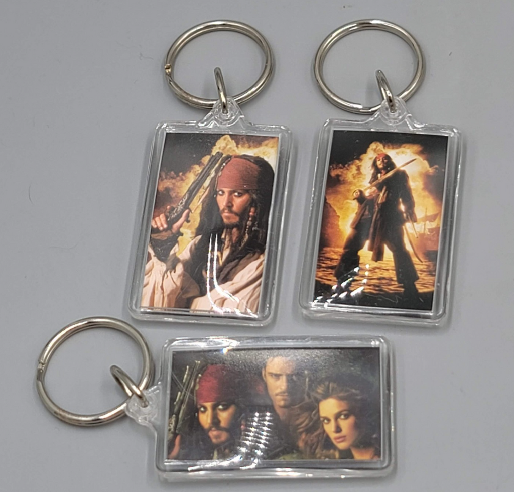 Disney PIRATES OF THE CARIBBEAN Dead Mans Chest Keychain Lot of 3