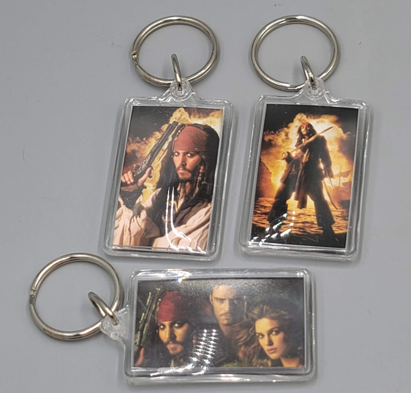 Disney PIRATES OF THE CARIBBEAN Dead Mans Chest Keychain Lot of 3