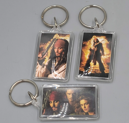 Disney PIRATES OF THE CARIBBEAN Dead Mans Chest Keychain Lot of 3