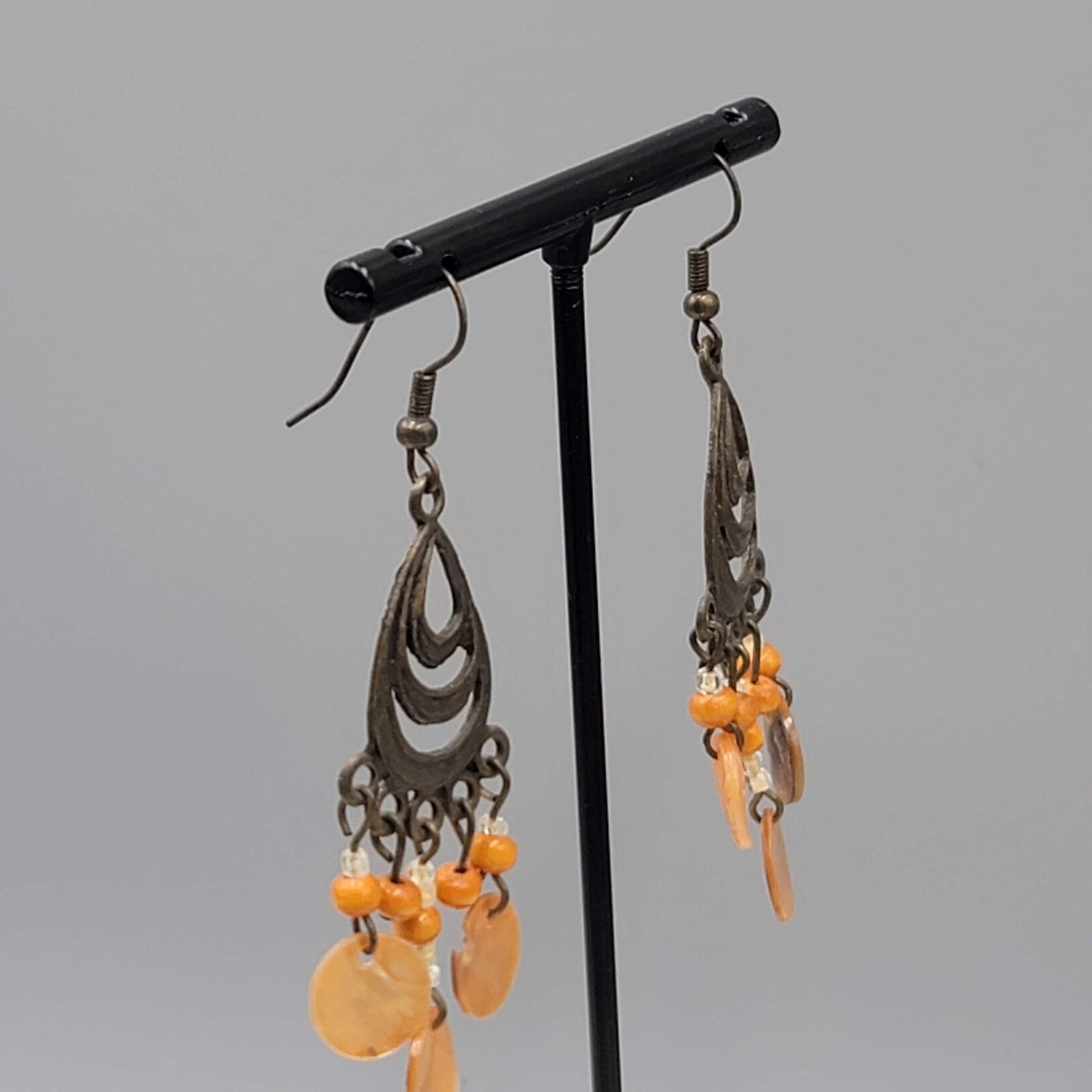 Bronze tone Chandelier Pierced Earrings Wood Bead Orange Shell Dangle 2"