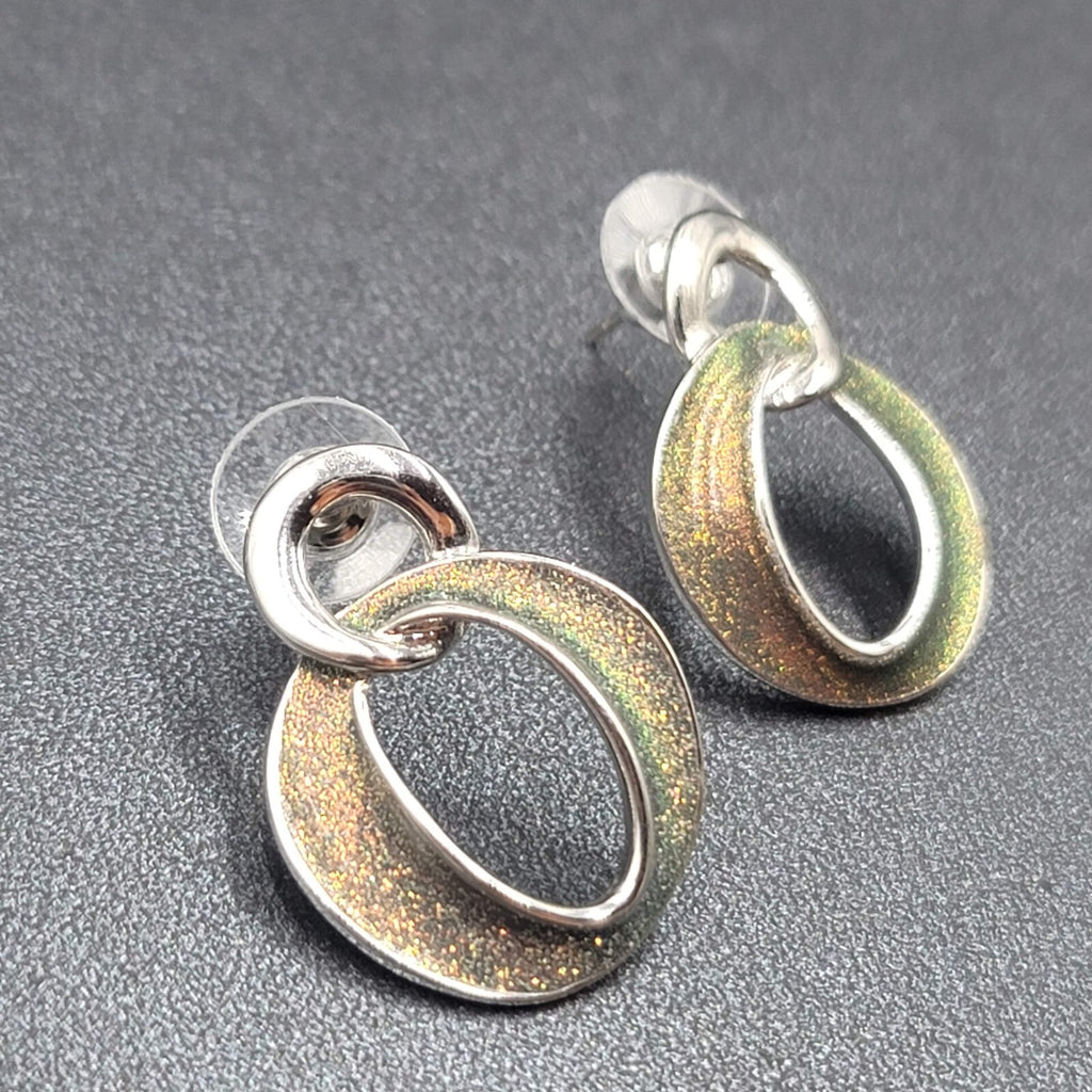 Pierced Earrings Silver tone Iridescent Glitter Interlocking Rings Drop 1 1/8"