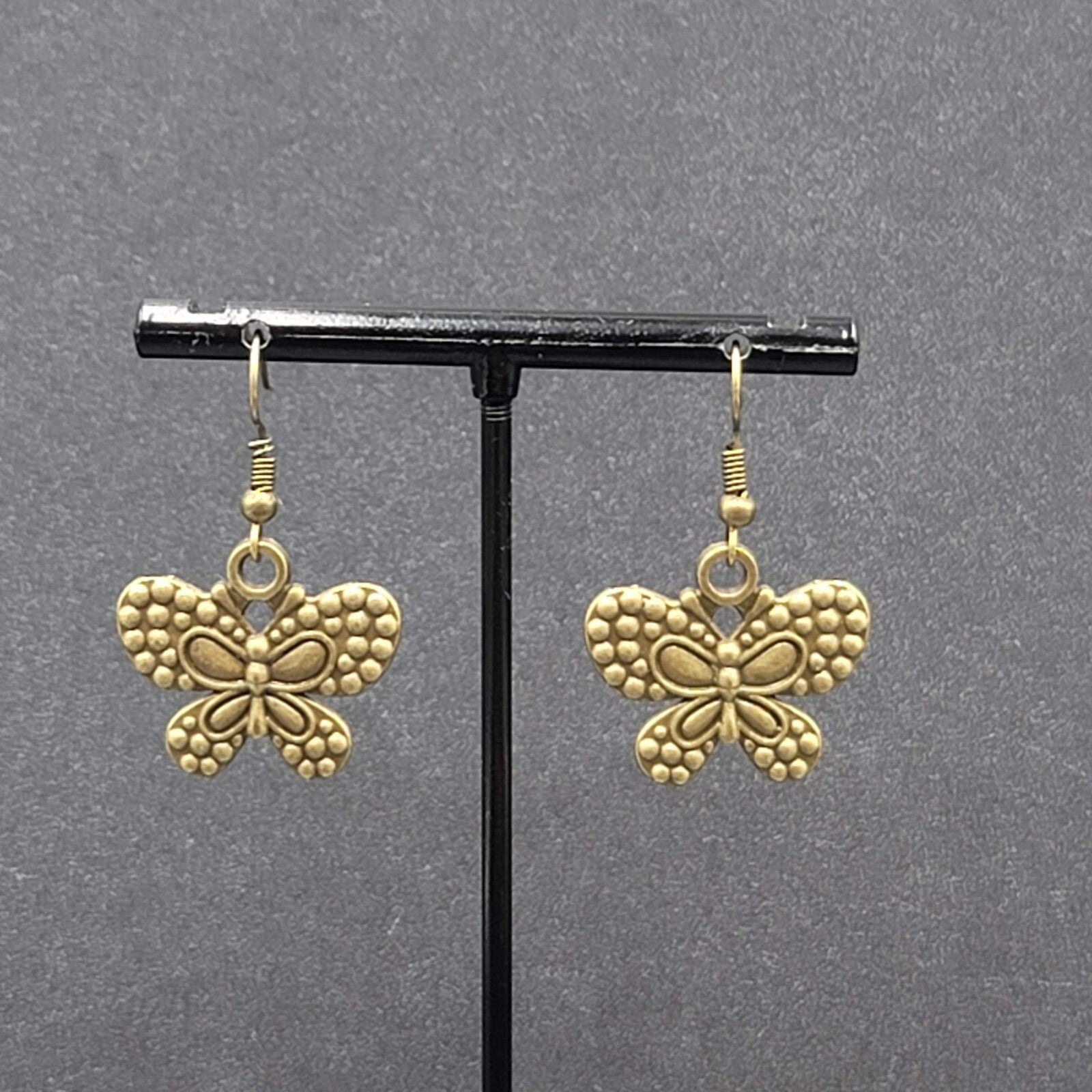 Butterfly Pierced Earrings Dangle Bronze tone Embossed 7/8"