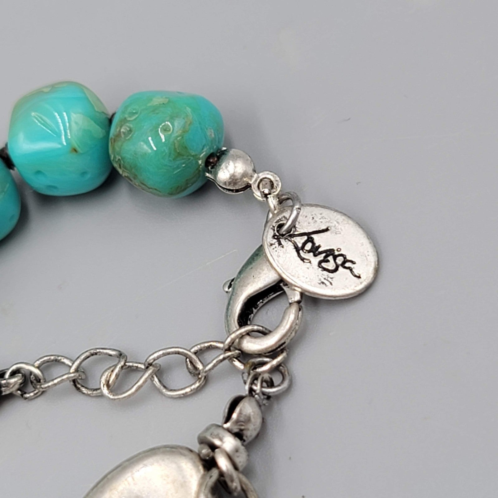 Louisa Bracelet Blue Pottery Bead Silver tone Feather Charm 6.75"-7.75"