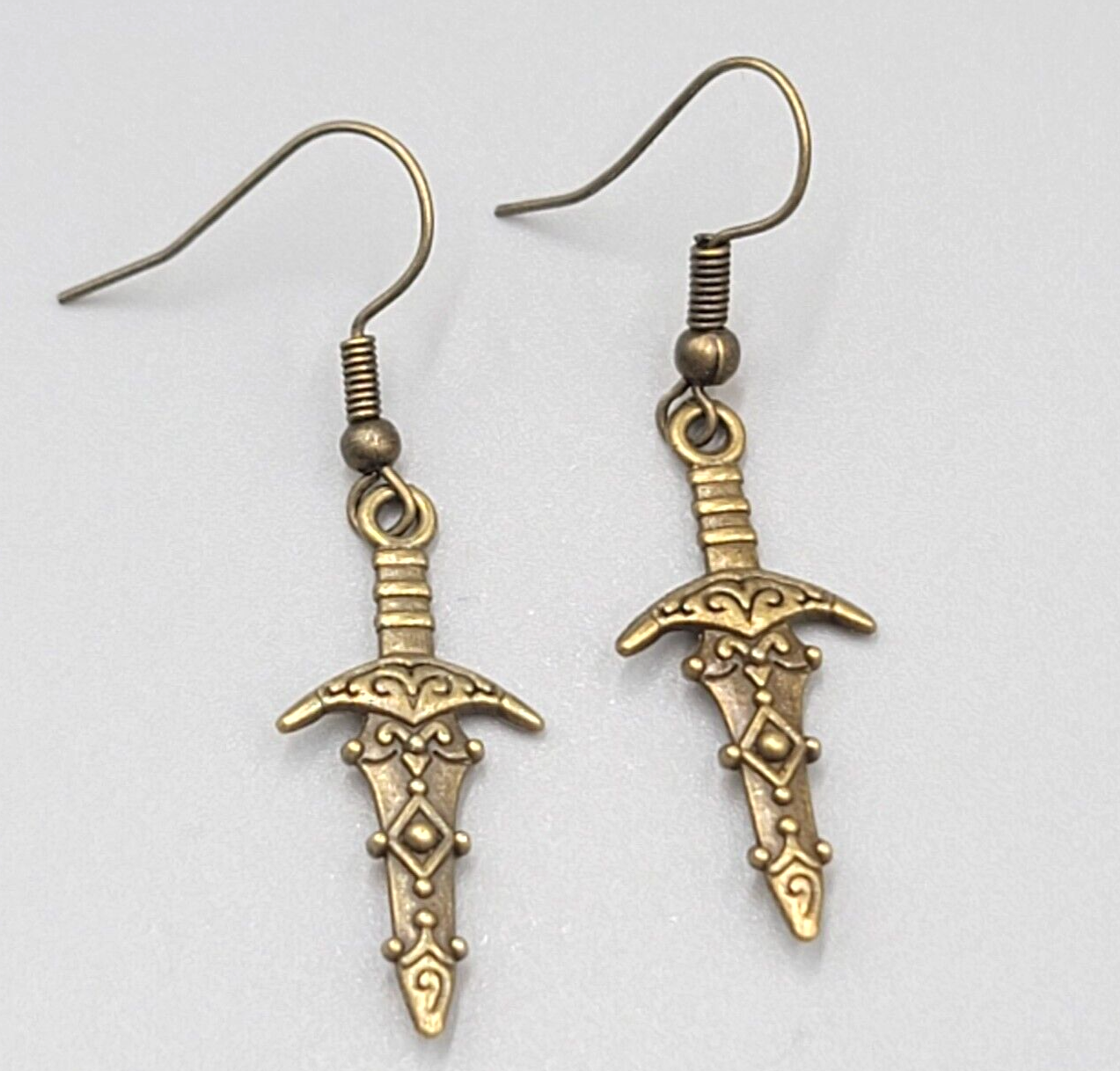 Fancy Embossed Dagger Pierced Earrings Bronze tone Dangle New 1"