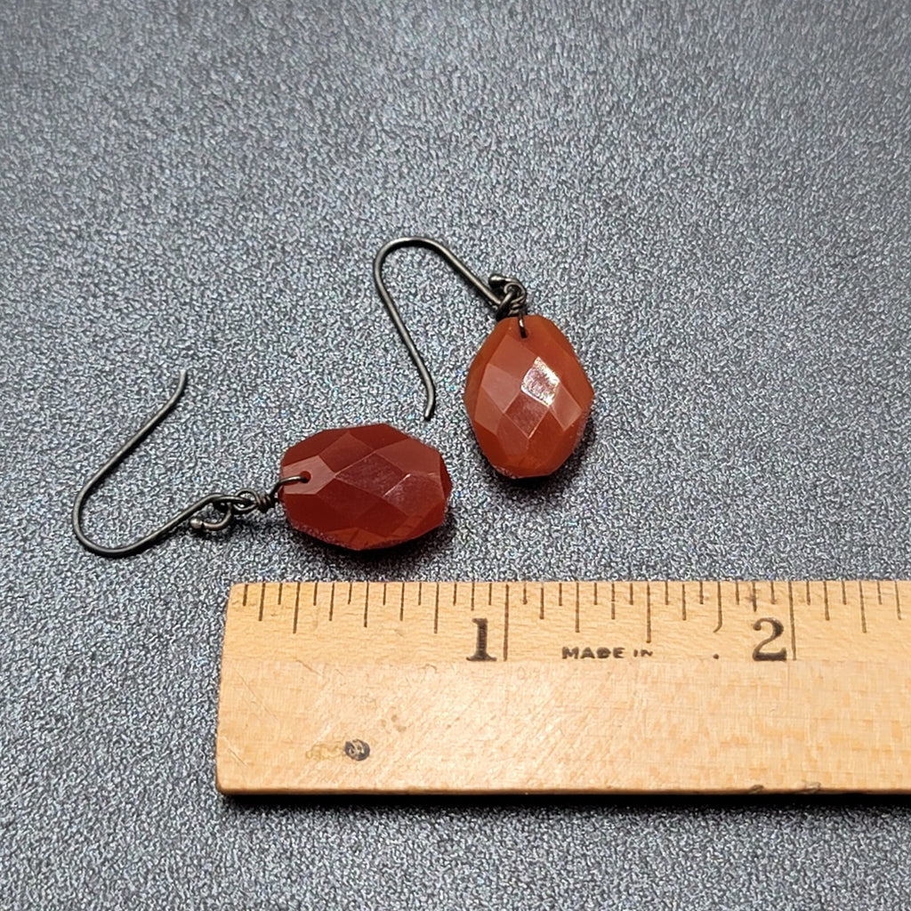 Pierced Earrings Carnelian Faceted Stone Bead Black Metal Dangle 5/8"