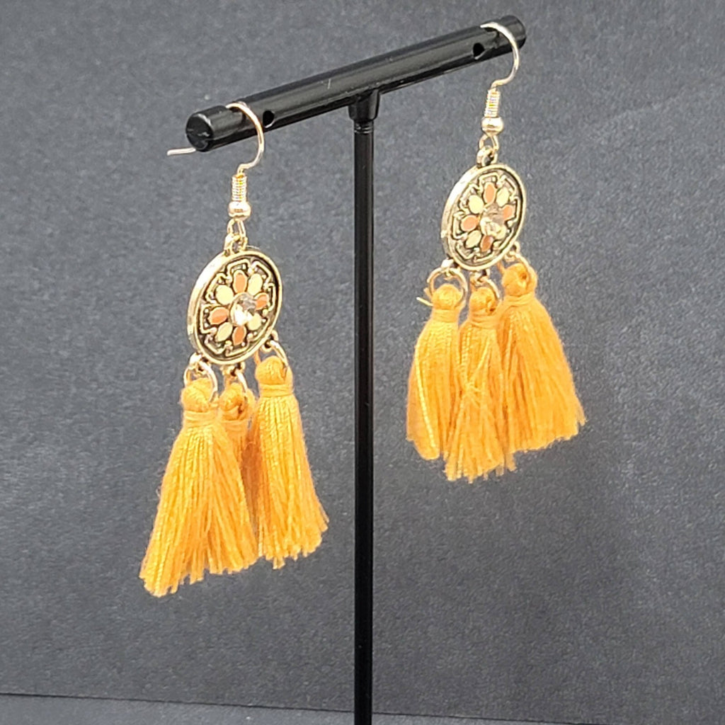 Pierced Earrings Gold tone Orange Tassel Rhinestone Medallion Dangle 1.75"