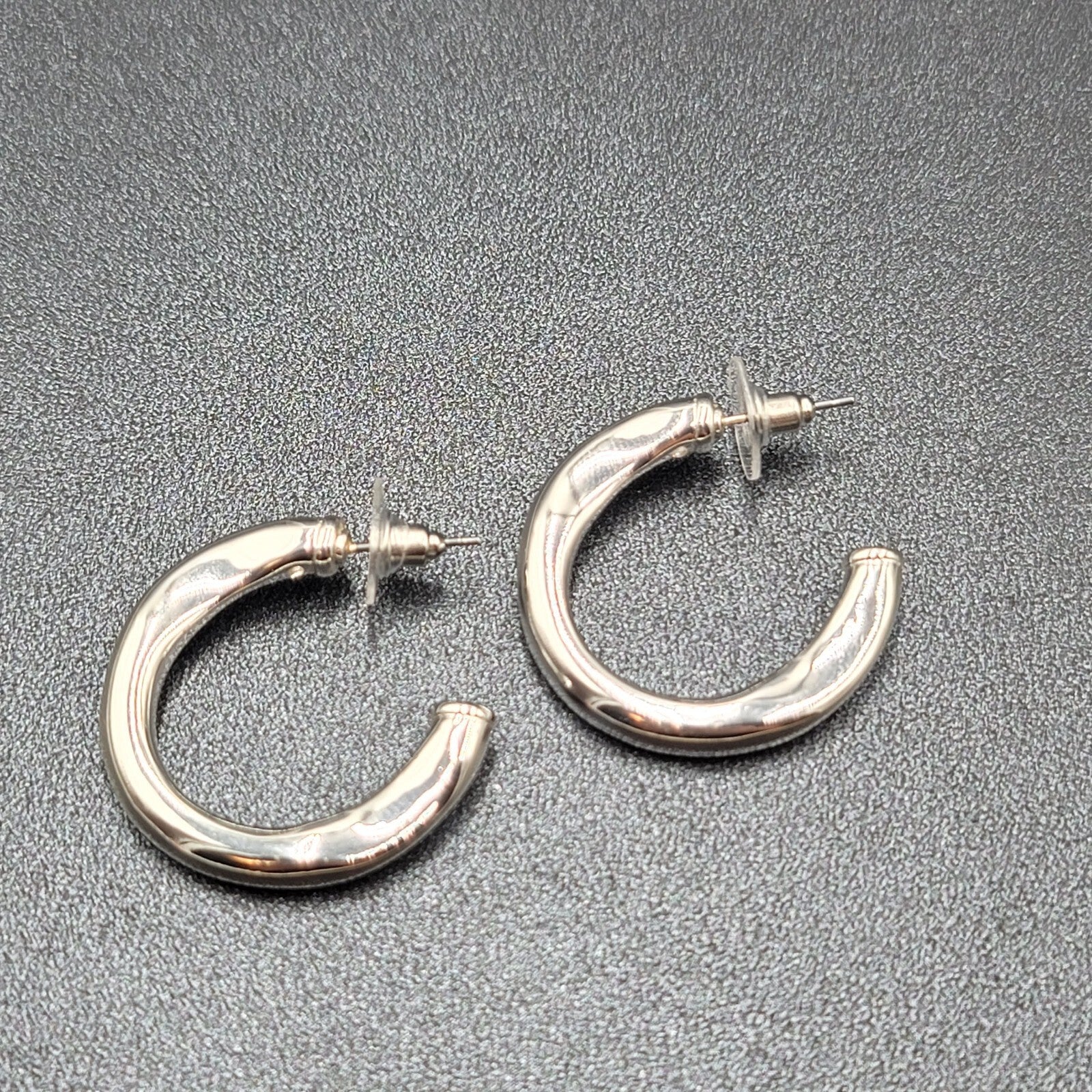 Pierced Earrings Polished Silver Plated Wavy Hoops Diamond Accent 1 1/8"