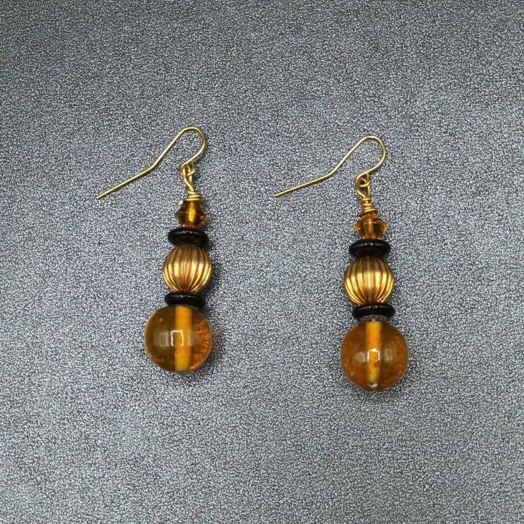Pierced Earrings Gold tone Orange Black Beaded Statement Dangle 1.5"