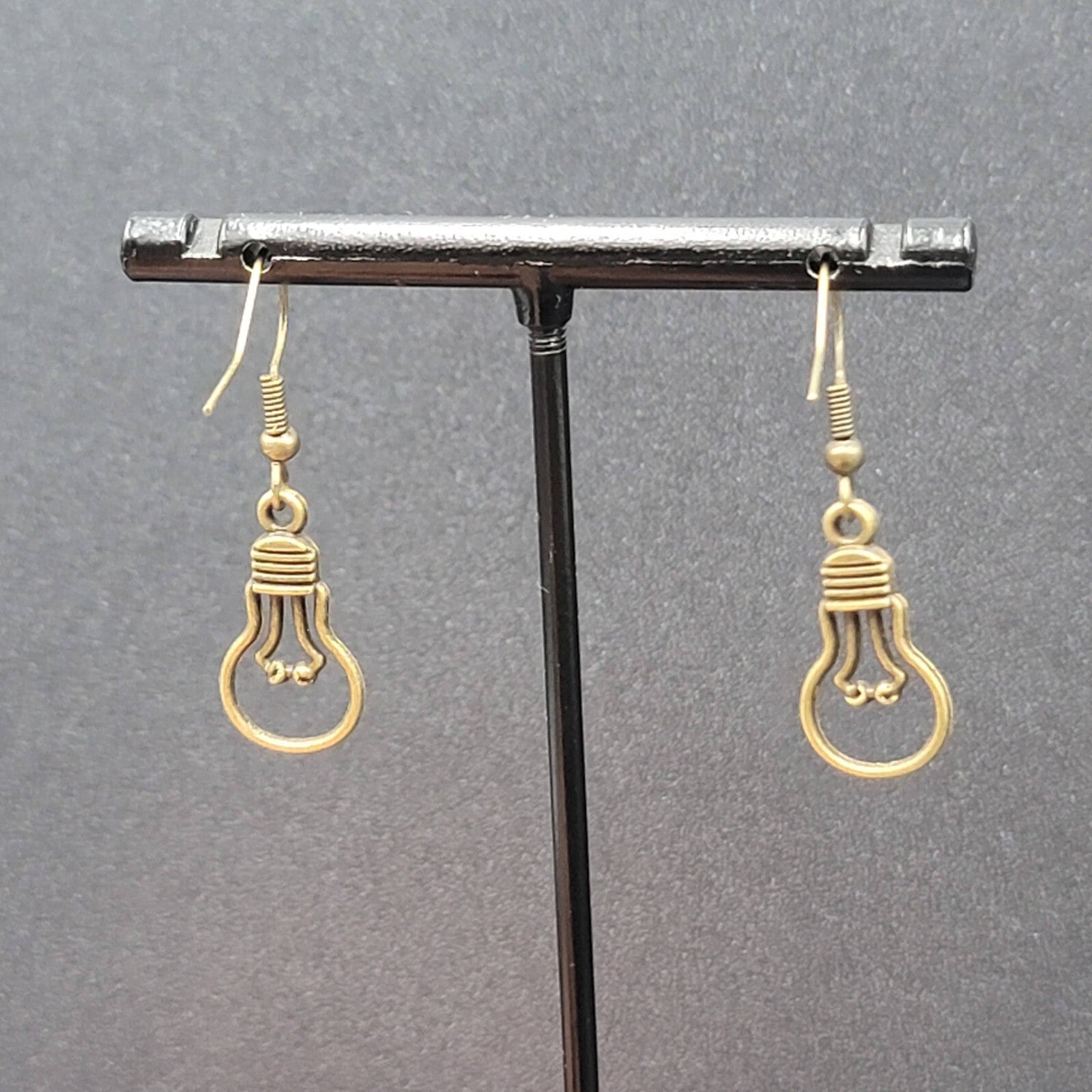 NEW Light Bulb Idea Pierced Earrings Bronze tone Dangle 7/8"