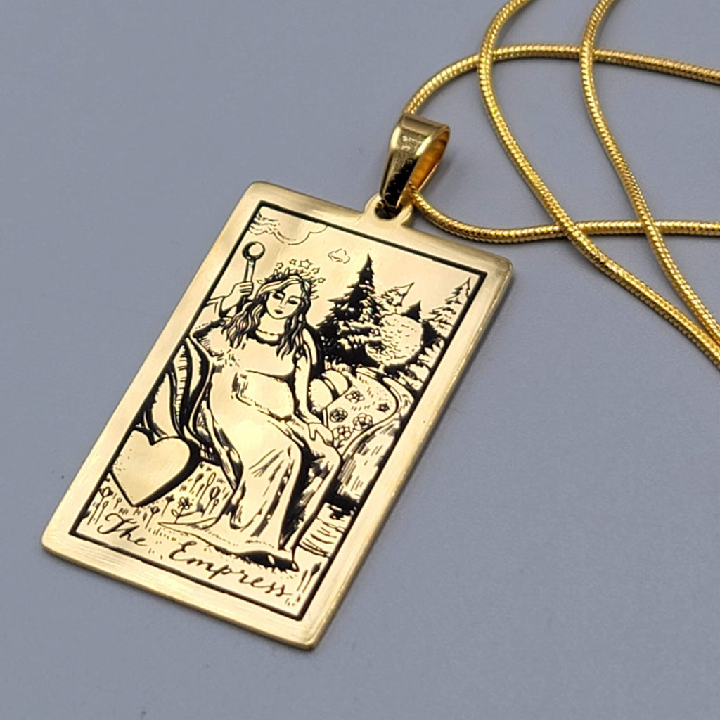 The EMPRESS Tarot Card Pendant Necklace Major Arcana Gold tone 18”.