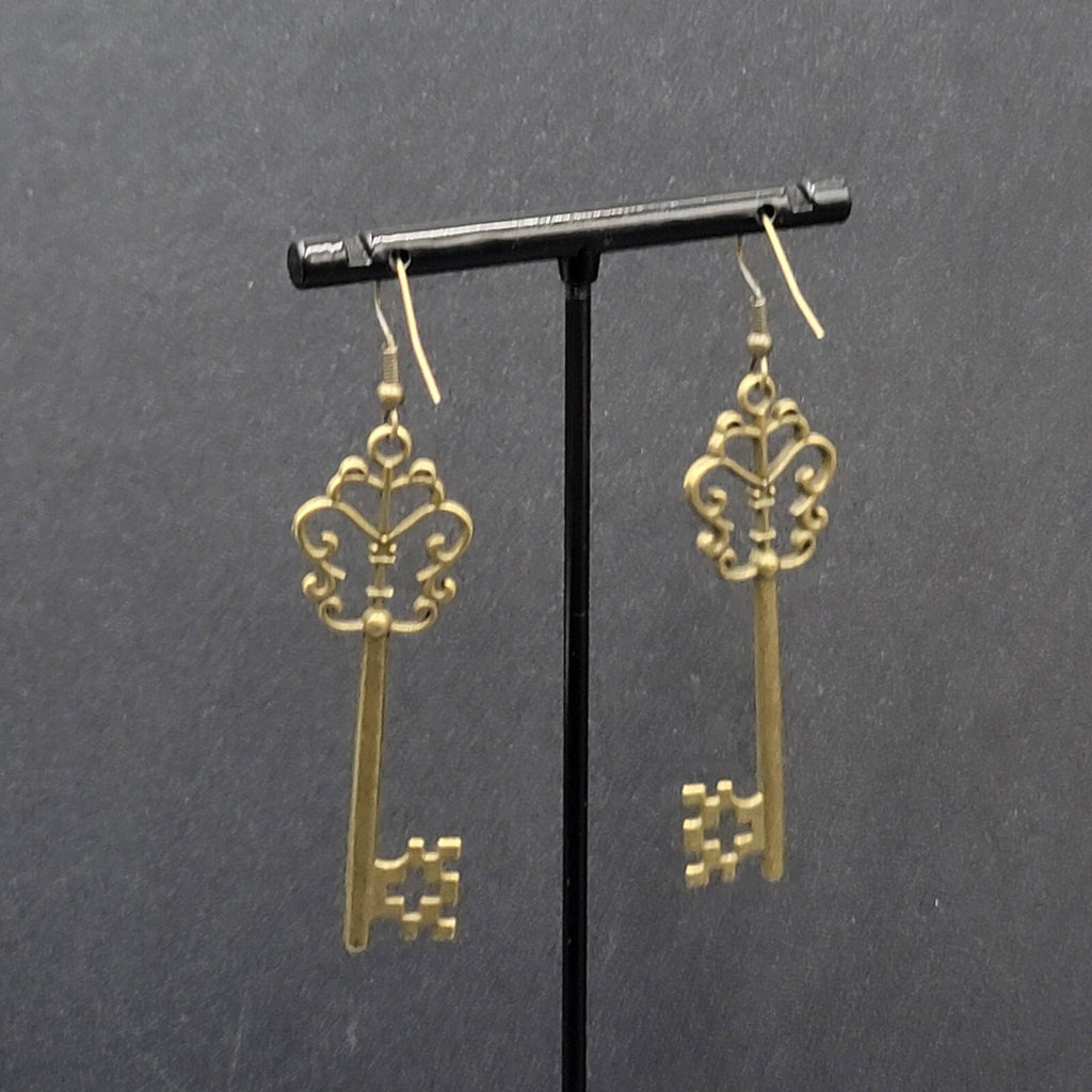 Pierced Earrings Bronze tone Long Antique Skeleton Key Dangle 2.25"